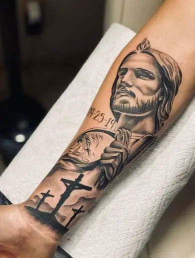Three Crosses and San Judas Forearm Tattoo