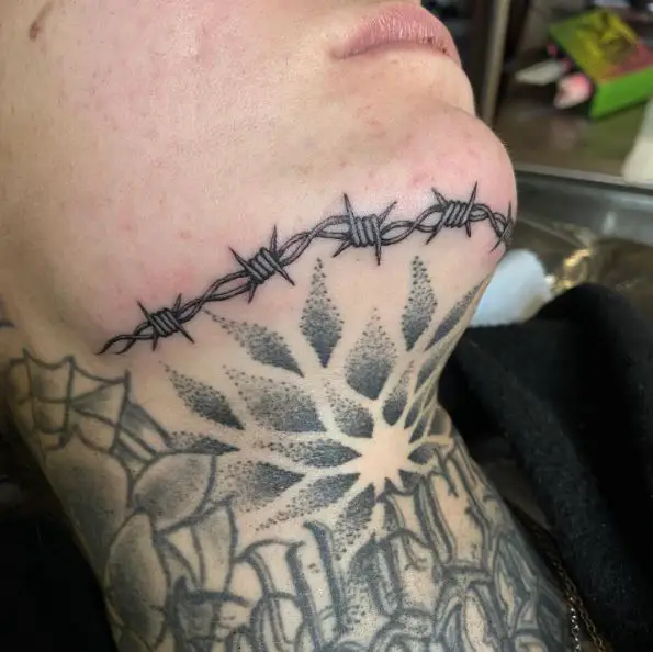Single needle barbed wire under the chin