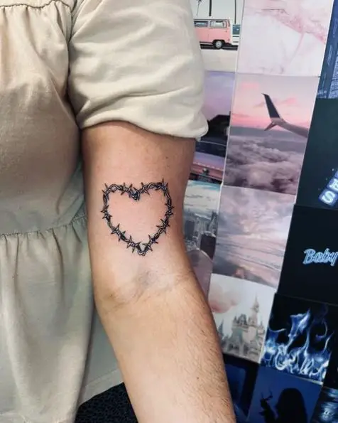 Small Barbed Wire Heart Hand Tattoo