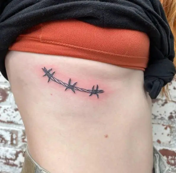 Small Grey Thorn Wire Rib Tattoo