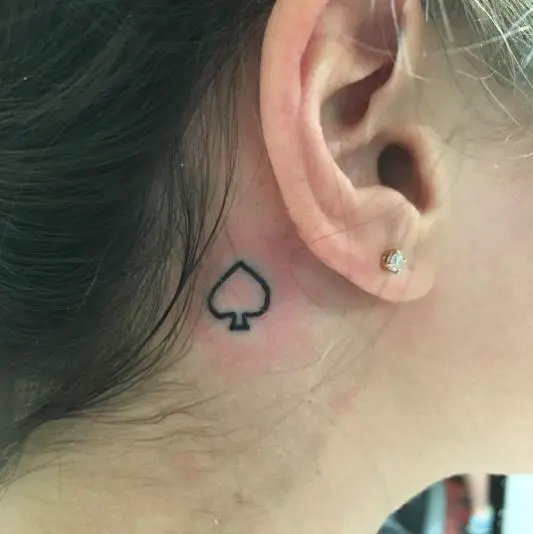 Small Line Only Spade Tattoo Behind the Ear