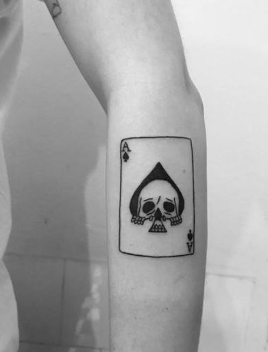 Skull-Themed Spade Cards Tattoo