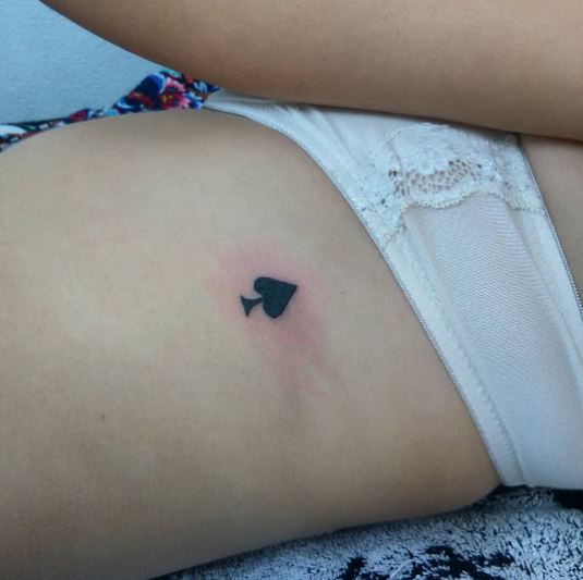 Small Spade Rib Tattoo