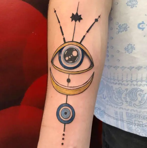 Space Themed Evil Eye Forearm Tattoo