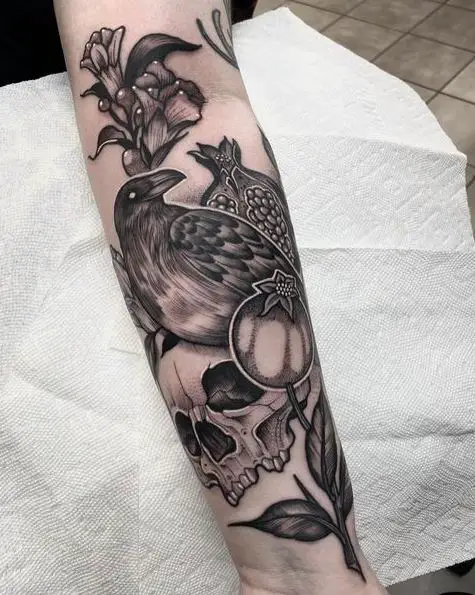 Spooky Forearm Tattoo Piece with Raven