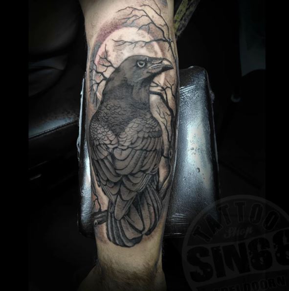 Staring Raven Forearm Tattoo
