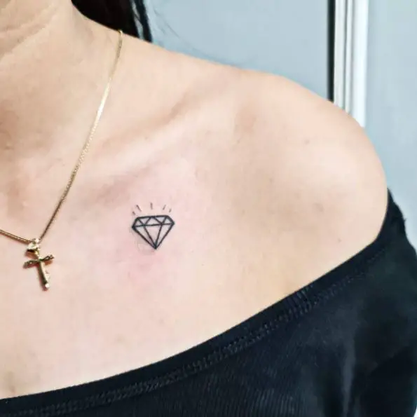 Tiny Diamond with Spark Chest Tattoo