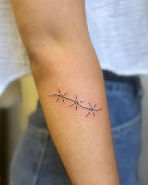 Tiny Handpoked Barbed Wire Tattoo