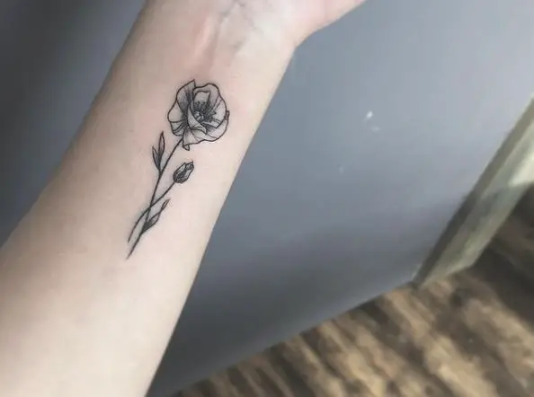 Tiny Poppy Flower Tattoo