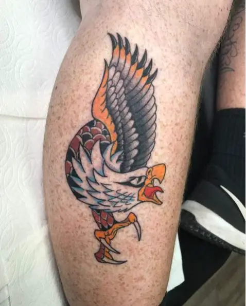 Traditional eagle calf tattoo