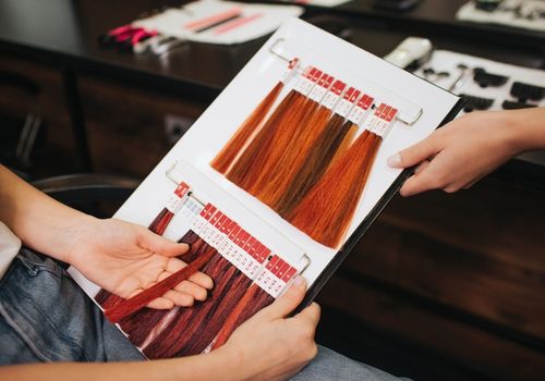 Woman Choosing a Suitable Hair color