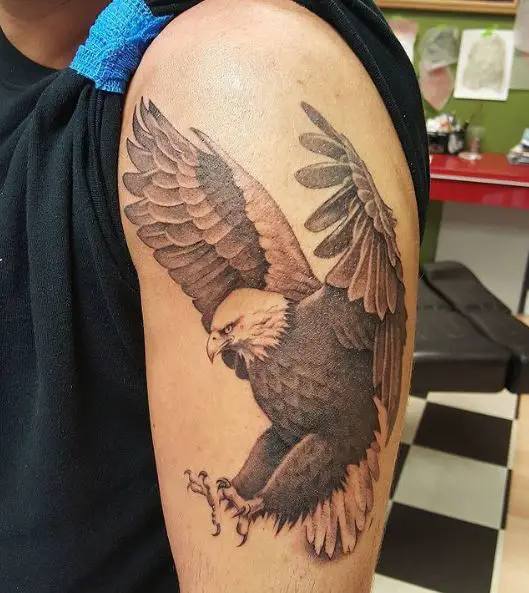black and gray eagle sleeve tattoo