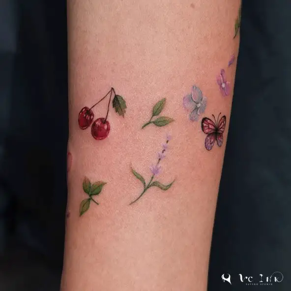 Flowers Butterflies and Cherry Arm Tattoo