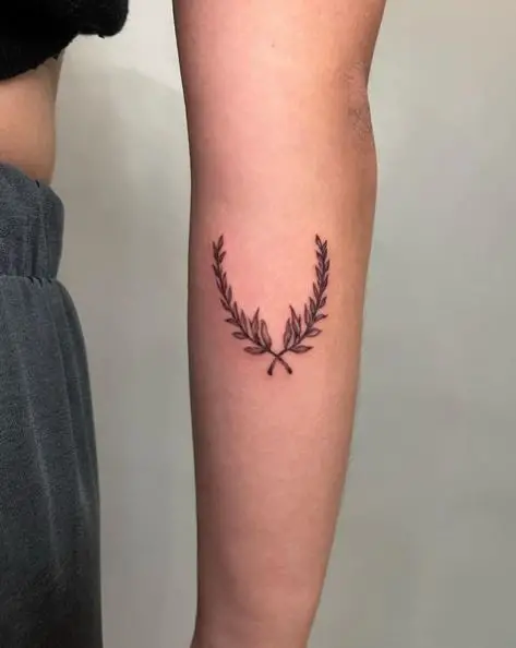 Minimalistic Laurel Wreath Elbow Tattoo