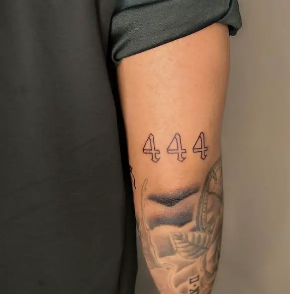 Grey and White 444 Arm Tattoo