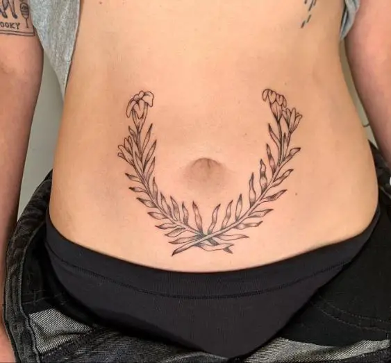 Laurel Wreath with Flowers Belly Tattoo