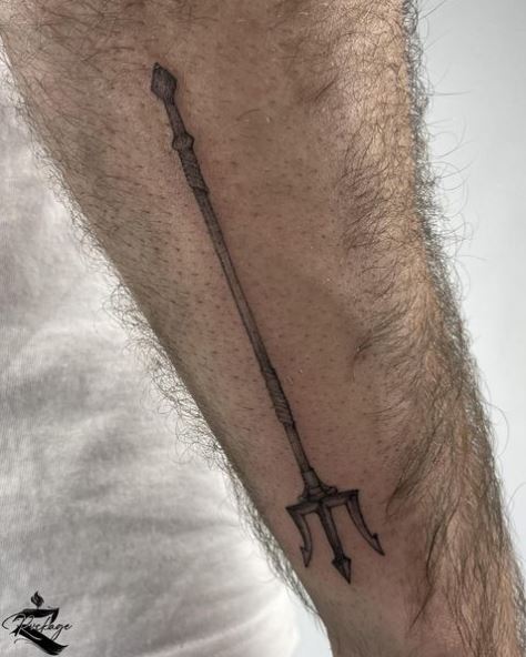 Small Trident Arm Tattoo