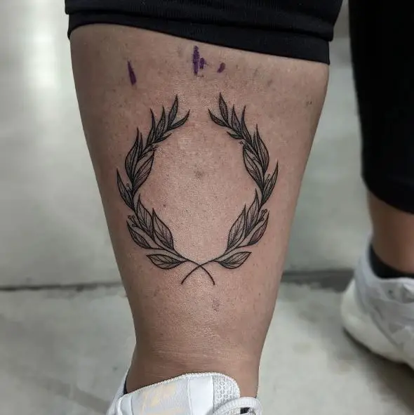 Small Laurel Wreath Leg Tattoo