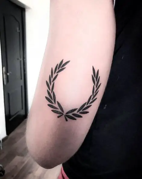 Black Laurel Wreath Arm Tattoo