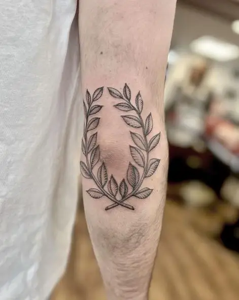 Grey Laurel Wreath Elbow Tattoo