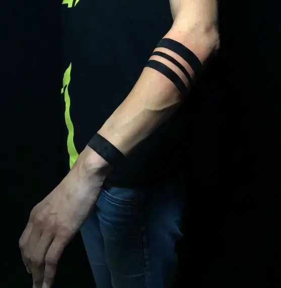 Multiple Solid Black Armband Tattoo