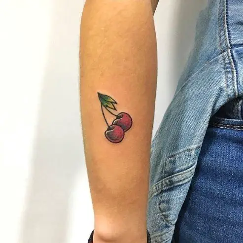 Small Colored Cherries Forearm Tattoo