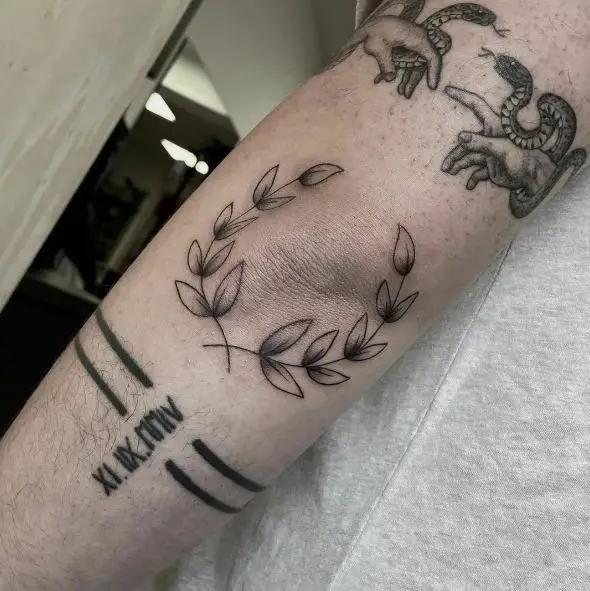 Grey and White Laurel Wreath Elbow Tattoo