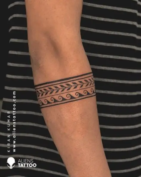 Tribal Armband with Leaves and Waves Tattoo