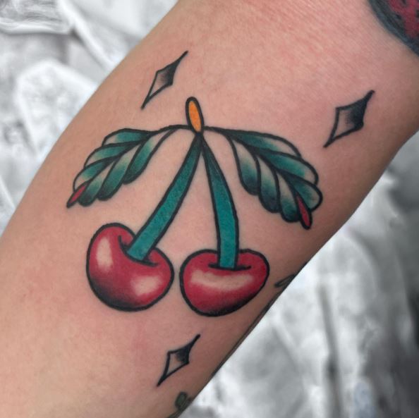 Diamonds and Cherries Arm Tattoo