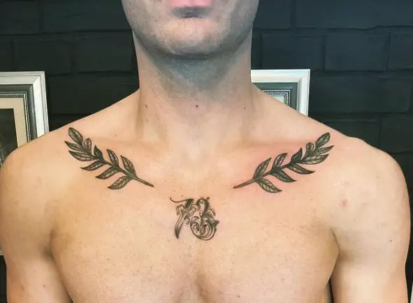 73 and Laurel Wreath Chest Tattoo