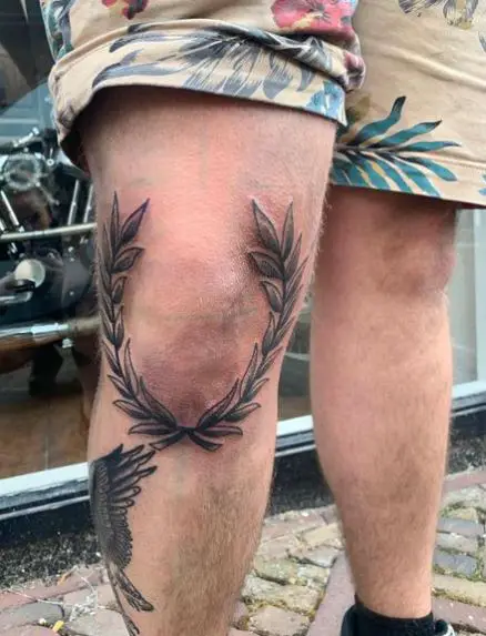 Black and Grey Laurel Wreath Knee Tattoo