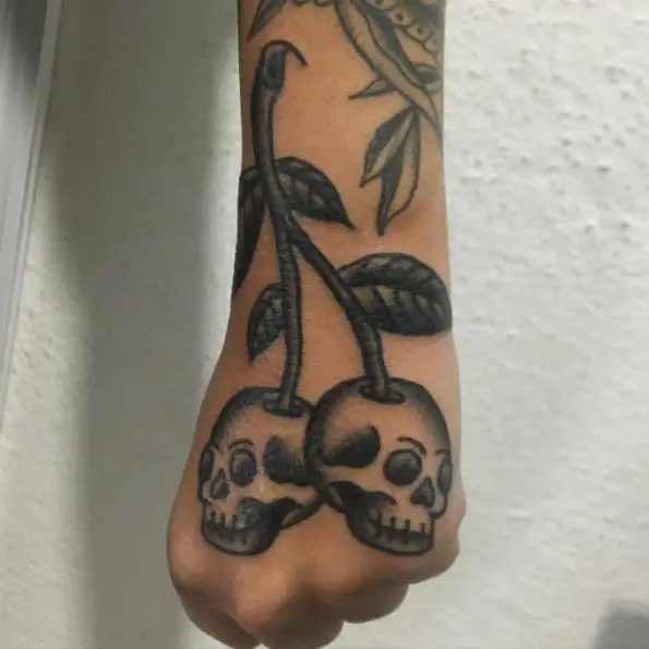Grey Skull Cherries Hand Tattoo