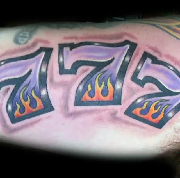 Burning Lucky 777 Biceps Tattoo