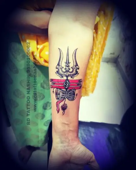 Red Stripes and Trishul Forearm Tattoo