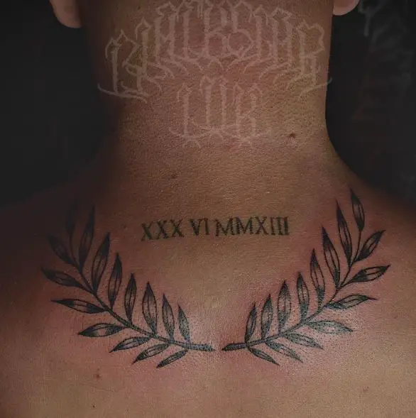 Roman Numbers and Laurel Wreath Back Tattoo