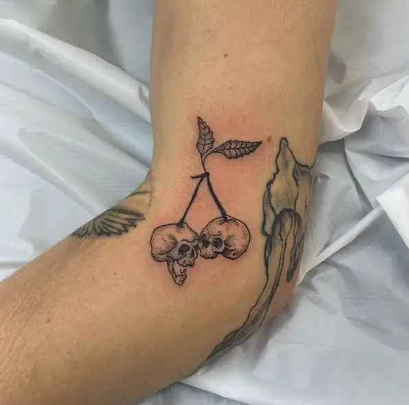 Grey Skull Cherry Elbow Tattoo