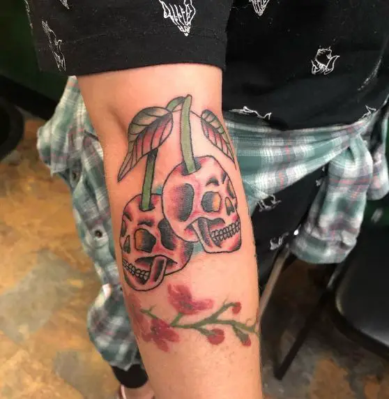 Flowers and Skull Cherry Arm Tattoo