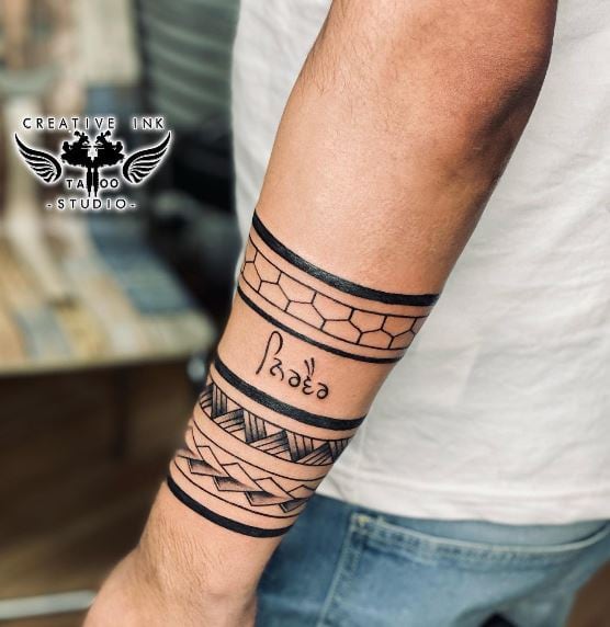 Multiple Armband Tattoo with Ornament and Letters