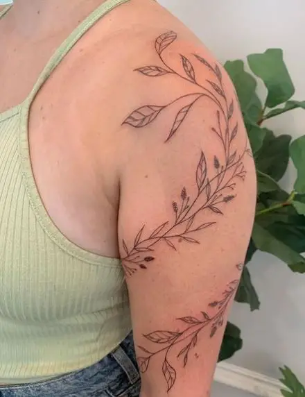 Arm Wrapping Vine Tattoo Art