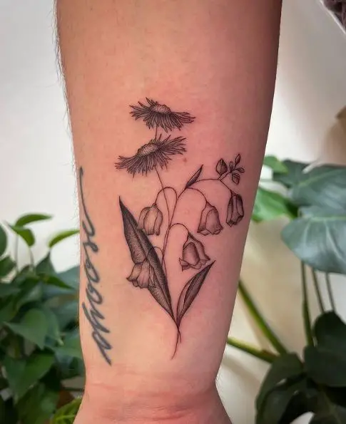Asters and Lily of the Valley Forearm Tattoo