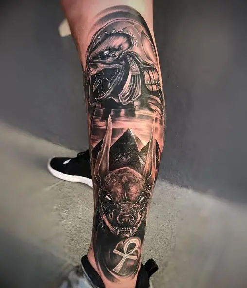 Black Inked Anubis Tattoo on Leg
