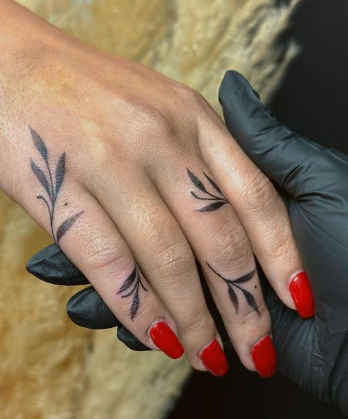 Black Leaves Finger Tattoo