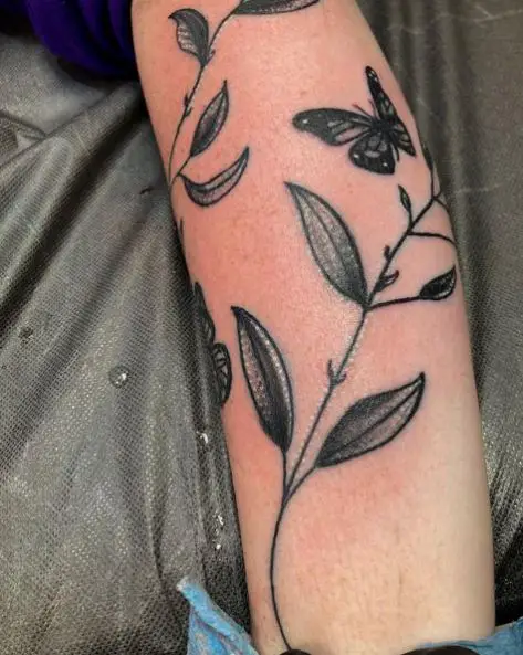 Black Leaves Vine and Butterfly Tattoo