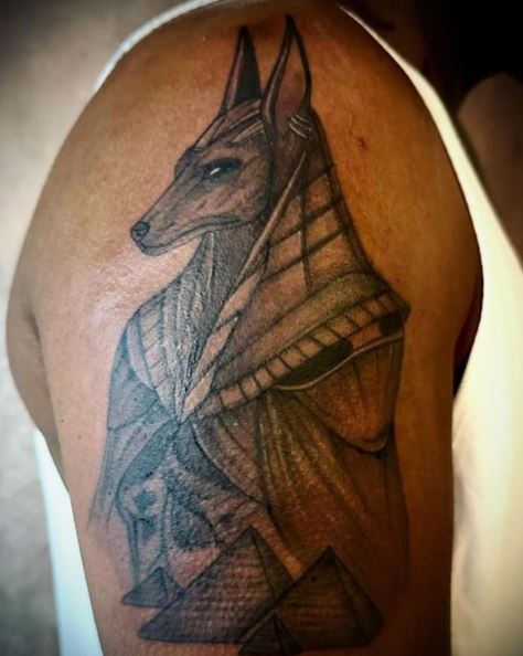 Black and Grey Anubis Arm Tattoo
