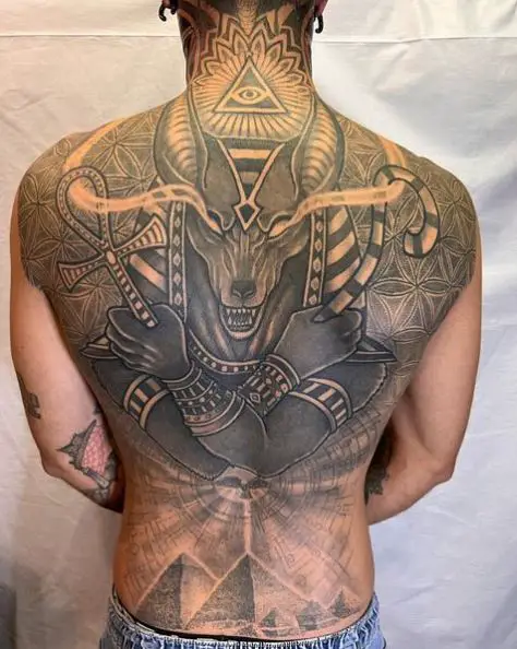 Black and Grey Anubis Back Tattoo