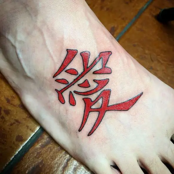 Black and Red Kanji Leg Tattoo