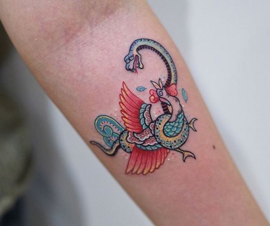 Blue and Pink Rooster and Snake Forearm Tattoo