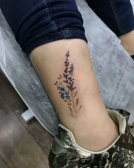 Blue and Purple Floral Tattoo Piece on Leg