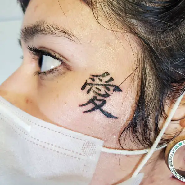 Brush Styled Kanji Face Tattoo