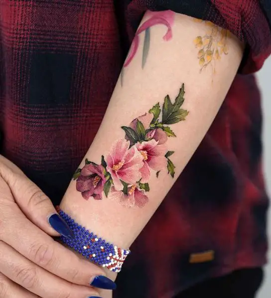 Bunch of Pink Hibiscus Flowers Forearm Tattoo